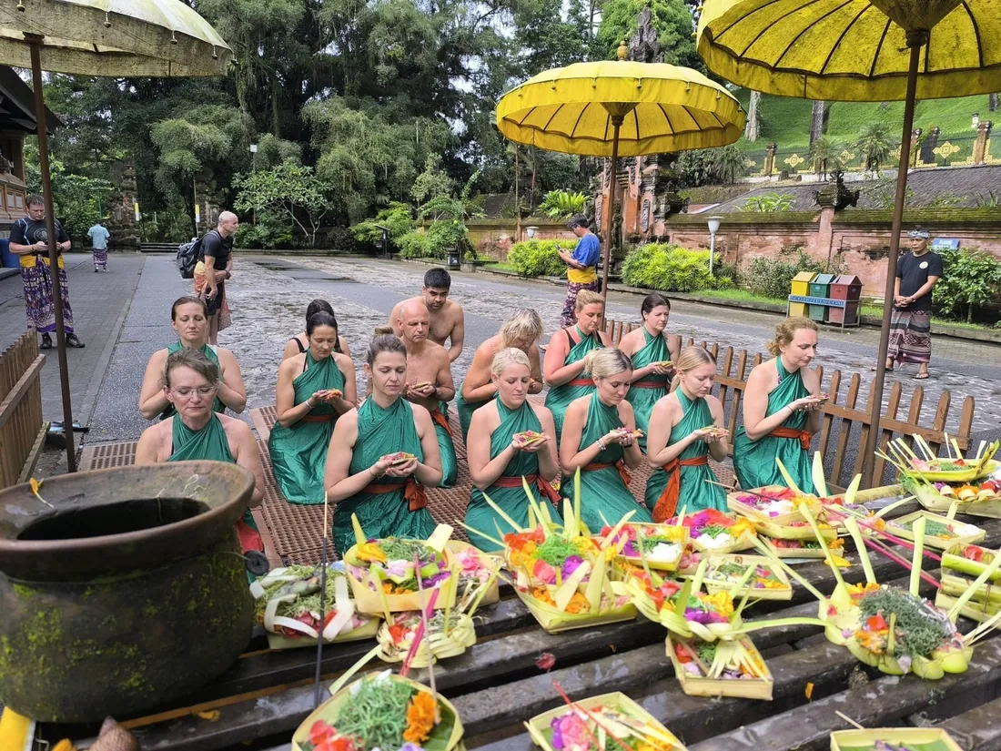 Travelers at a Balinese temple purification ceremony